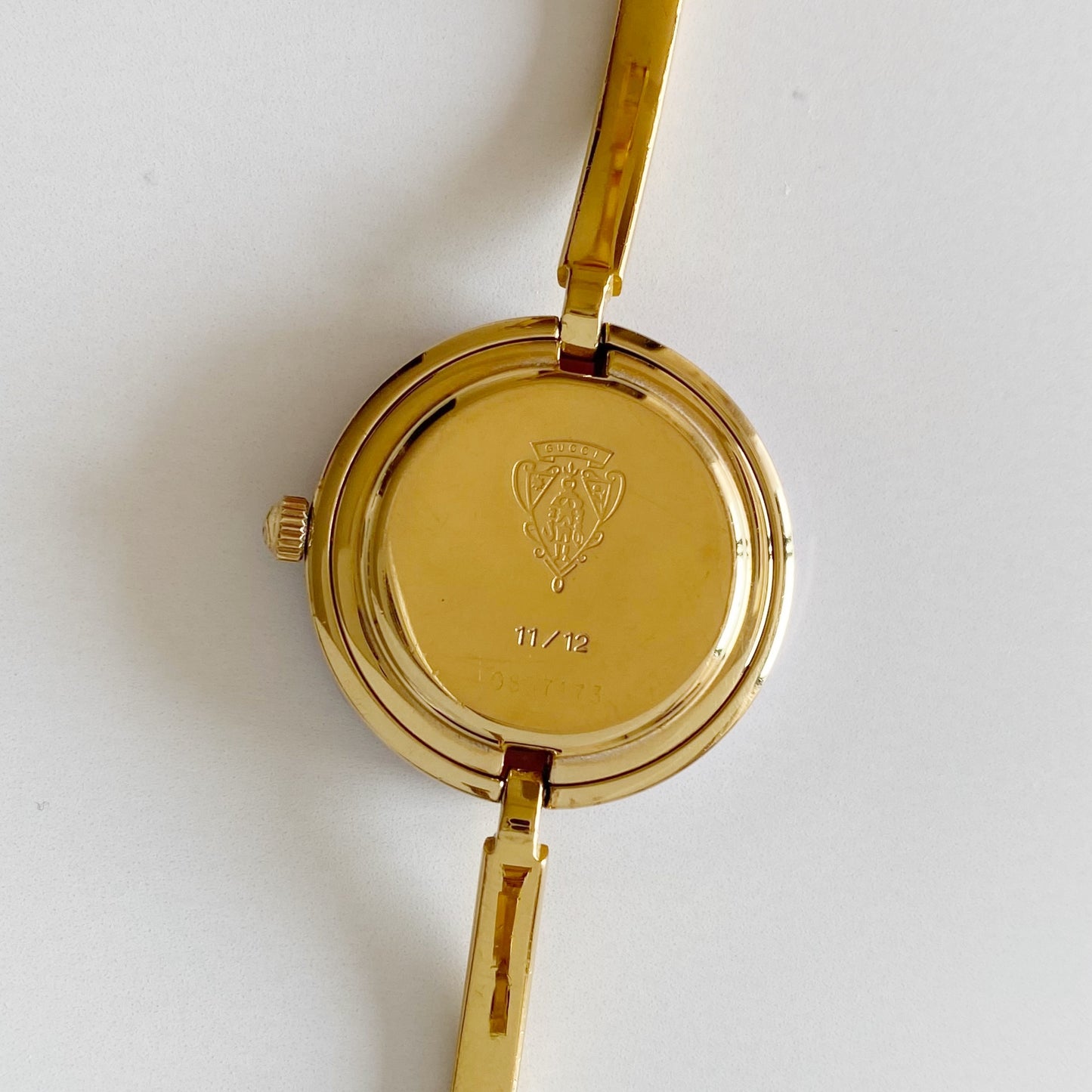 Gucci 1990s Interchangeable Bezel Gold Plated Bangle Watch with 12 bezels, case