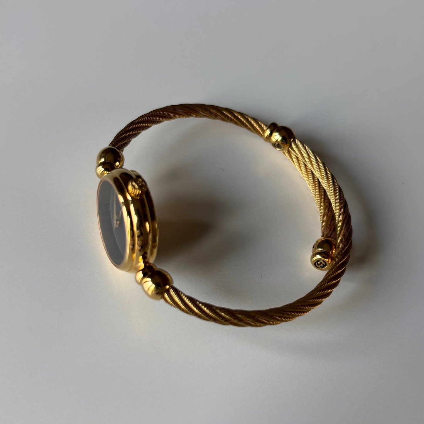 Gucci 1990s Black Dial Gold Plated Cable Bangle Watch
