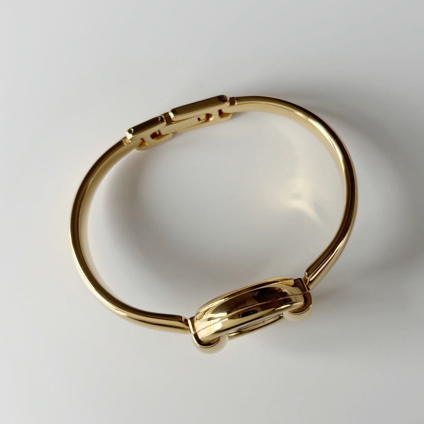Gucci 1990s Round Dial Gold Plated Bangle Watch