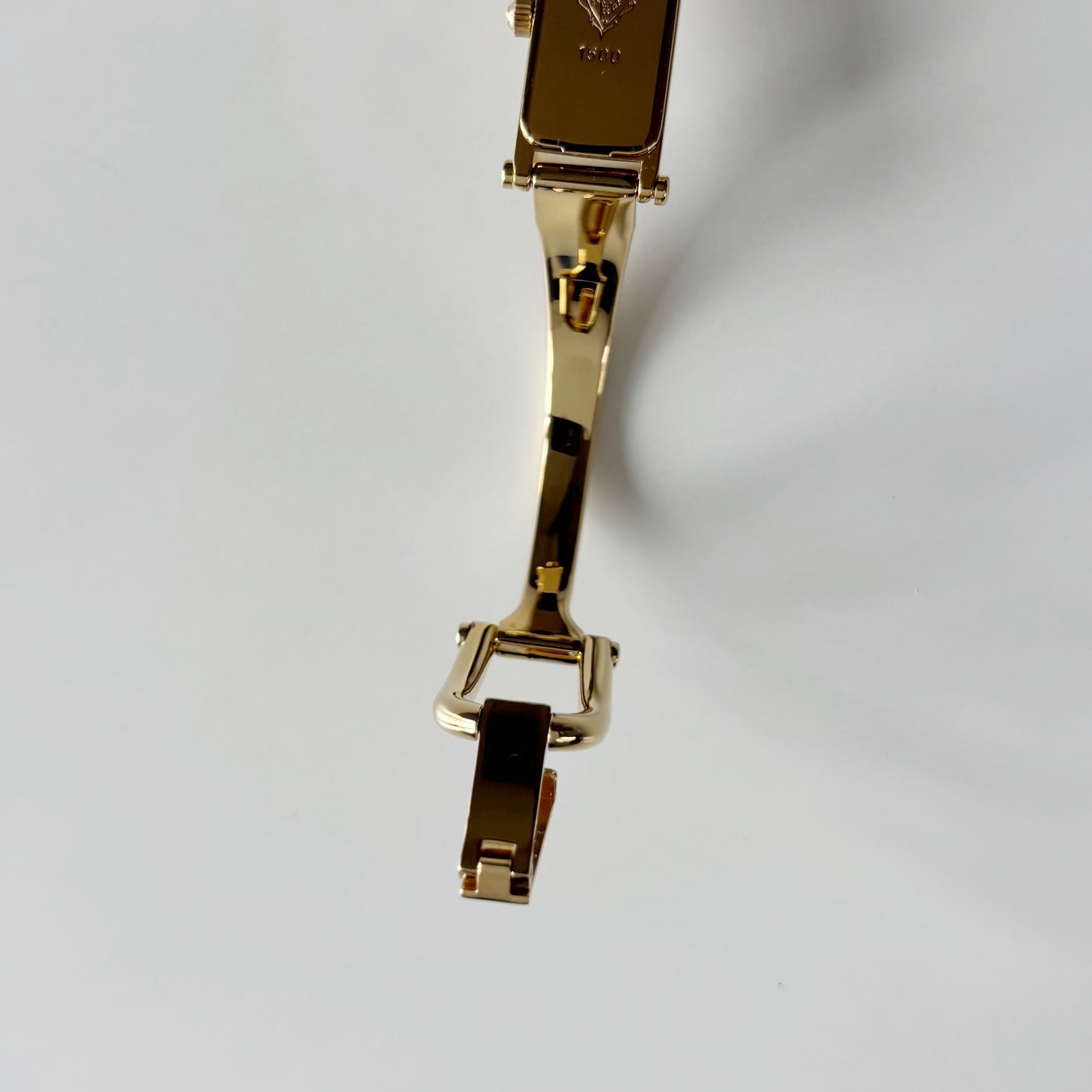 Gucci 1990s Gold Rectangular Dial Gold Plated Bangle Watch