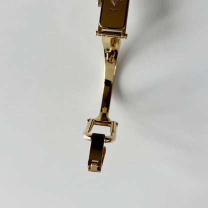 Gucci 1990s Gold Rectangular Dial Gold Plated Bangle Watch