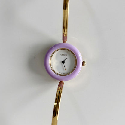Gucci 1990s Interchangeable Bezel Gold Plated Bangle Watch with 12 bezels, case