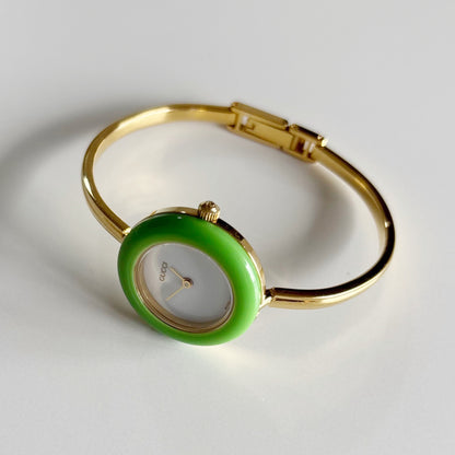 Gucci 1990sInterchangeable Bezel Gold Plated Bangle Watch with 12 bezels, case