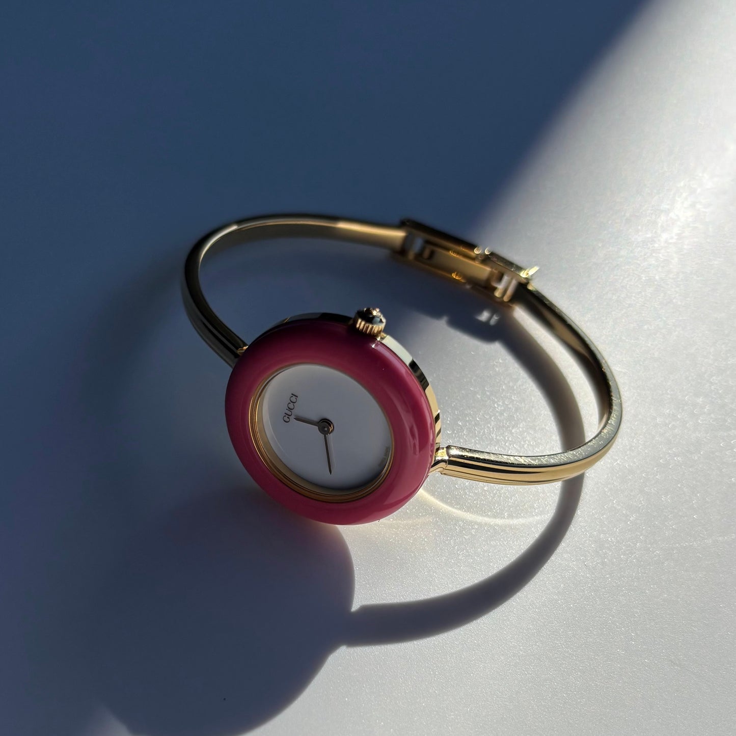 Gucci 1990s Interchangeable Bezel Gold Plated Bangle Watch with 12 bezels, case