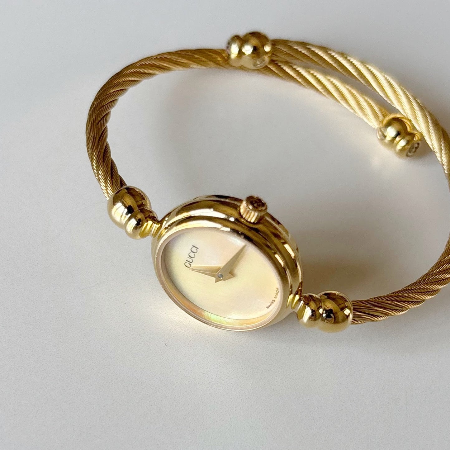 Gucci 1990s Seashell Dial Gold Plated Cable Bangle Watch