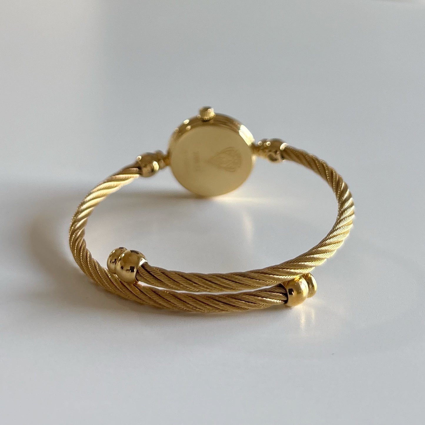 Gucci 1990s Seashell Dial Gold Plated Cable Bangle Watch