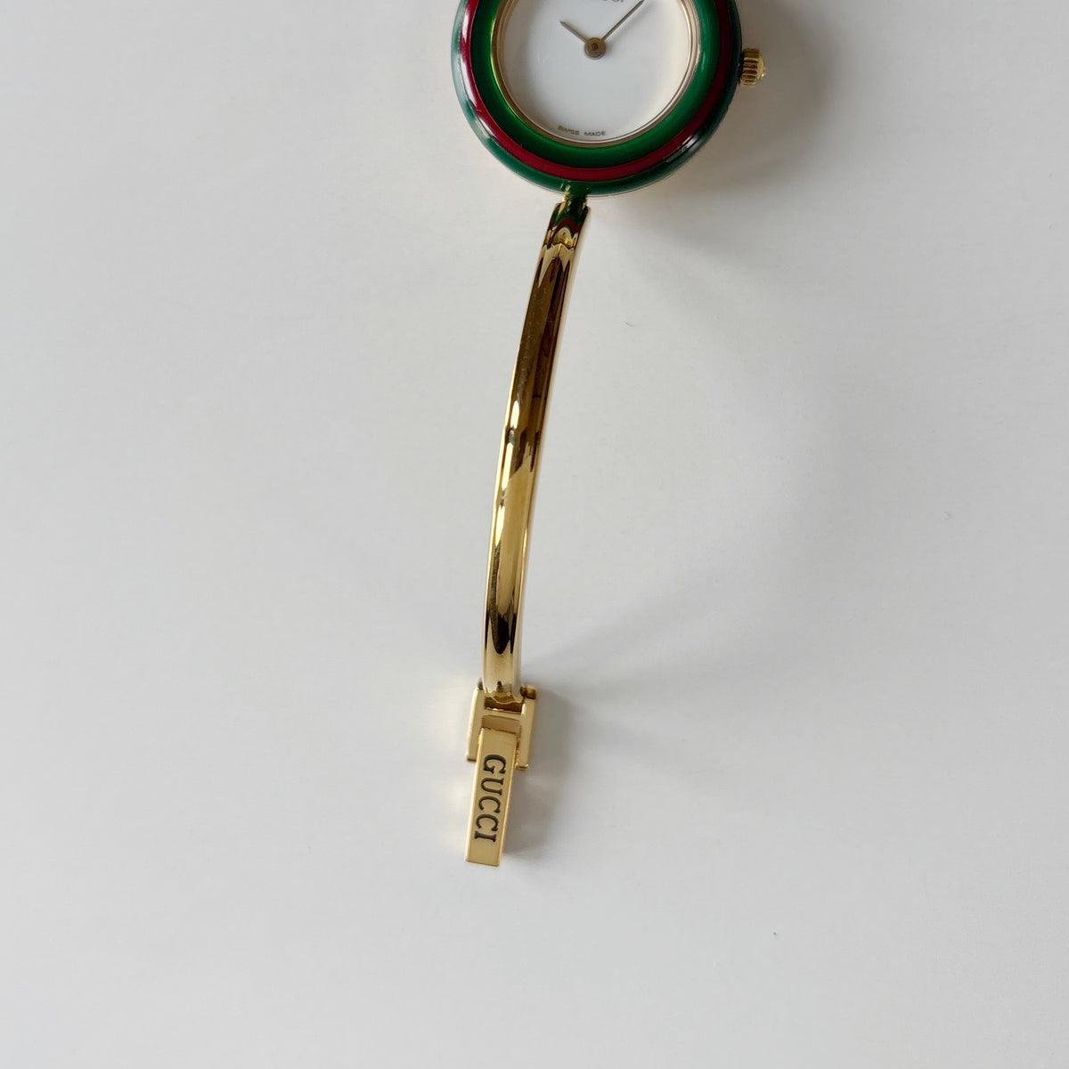 Gucci 1990s Interchangeable Bezel Gold Plated Bangle Watch with 12 bezels, case