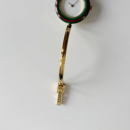 Gucci 1990s Interchangeable Bezel Gold Plated Bangle Watch with 12 bezels, case