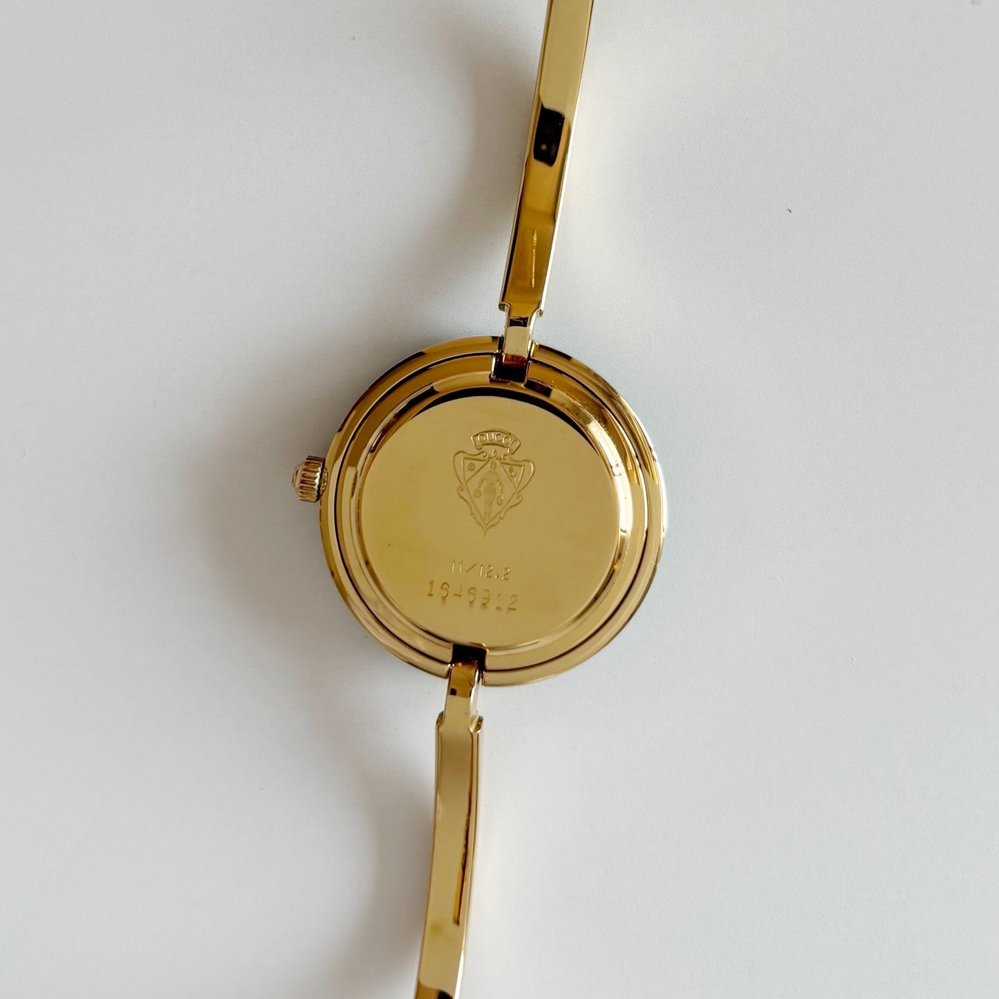 Gucci 1990s Interchangeable Bezel Gold Plated Bangle Watch with 12 bezels, case