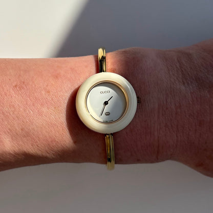 Gucci 1990s Interchangeable Bezel Gold Plated Bangle Watch with 12 bezels, case