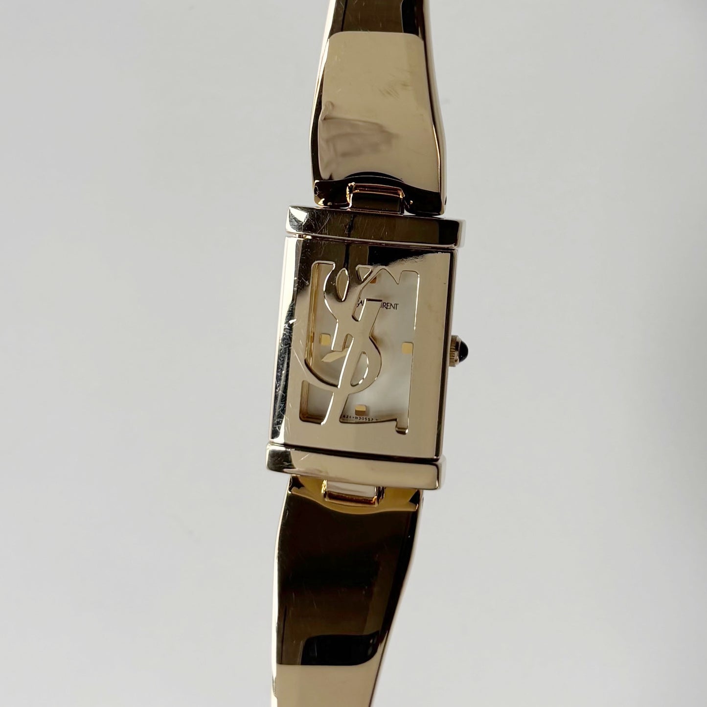 Yves Saint Laurent 1990s Peek-A-Boo Gold Plated Bangle Watch