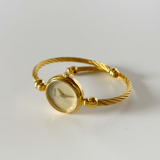 Gucci 1990s Seashell Dial Gold Plated Cable Bangle Watch