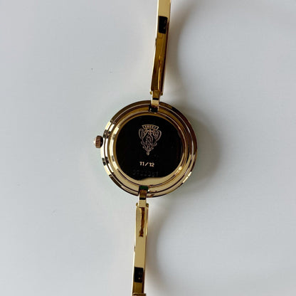 Gucci 1990s Interchangeable Bezel Gold Plated Bangle Watch with 12 bezels, case