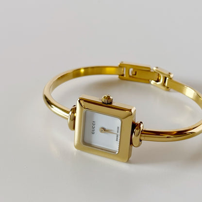 Gucci 1990s Square Dial Gold Plated Bangle Watch