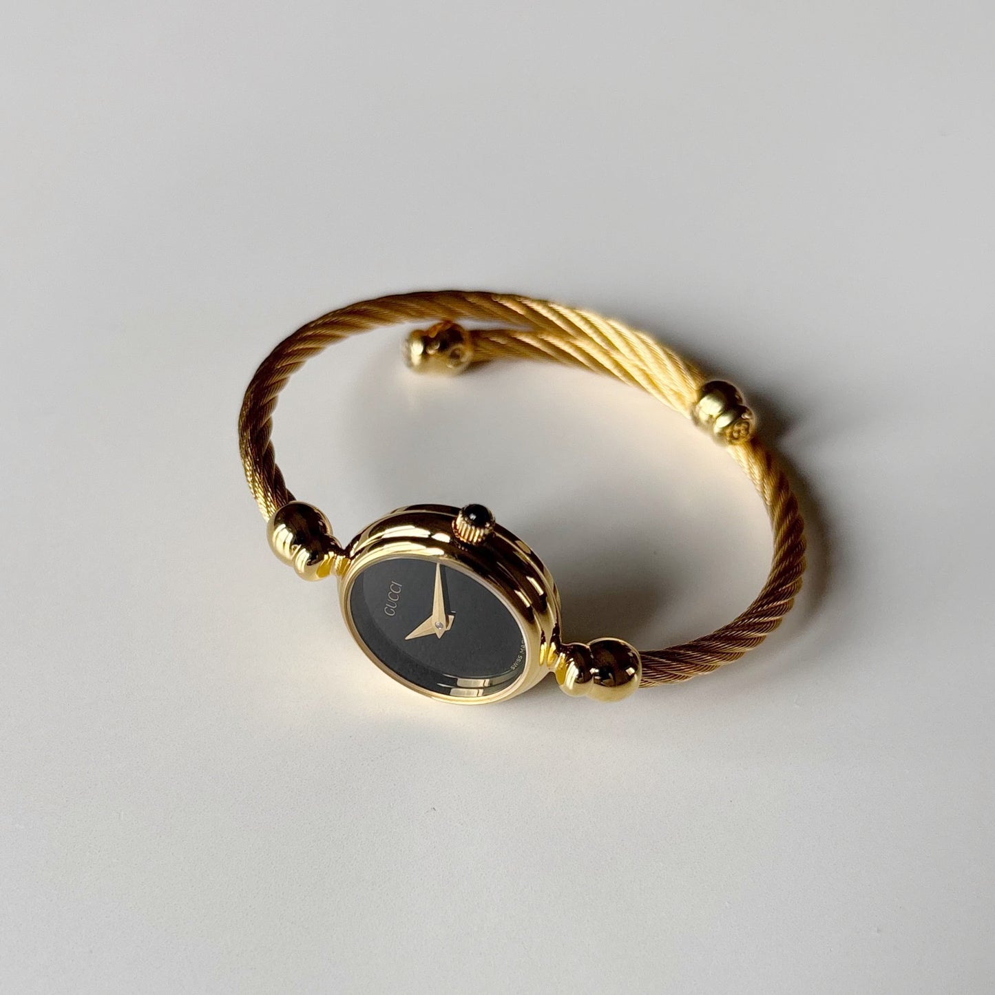 Gucci 1990s Black Dial Gold Plated Cable Bangle Watch