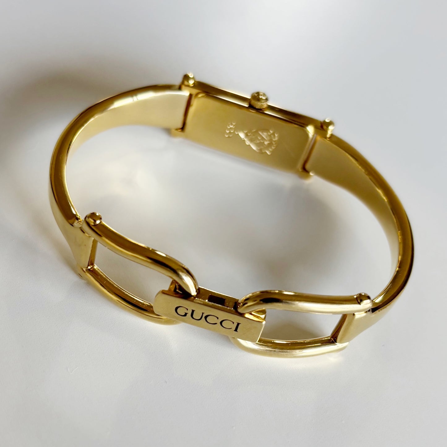 Gucci 1980s Rectangular Gold Dial Gold Plated Bangle Watch