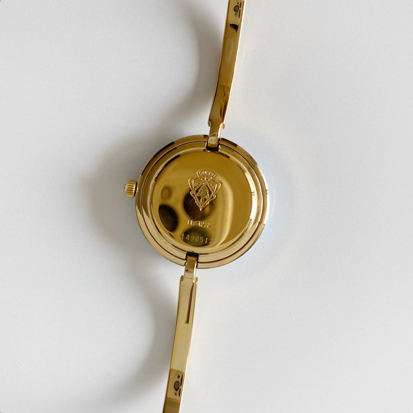 Gucci 1990s Interchangeable Bezel Gold Plated Bangle Watch with 12 bezels, case