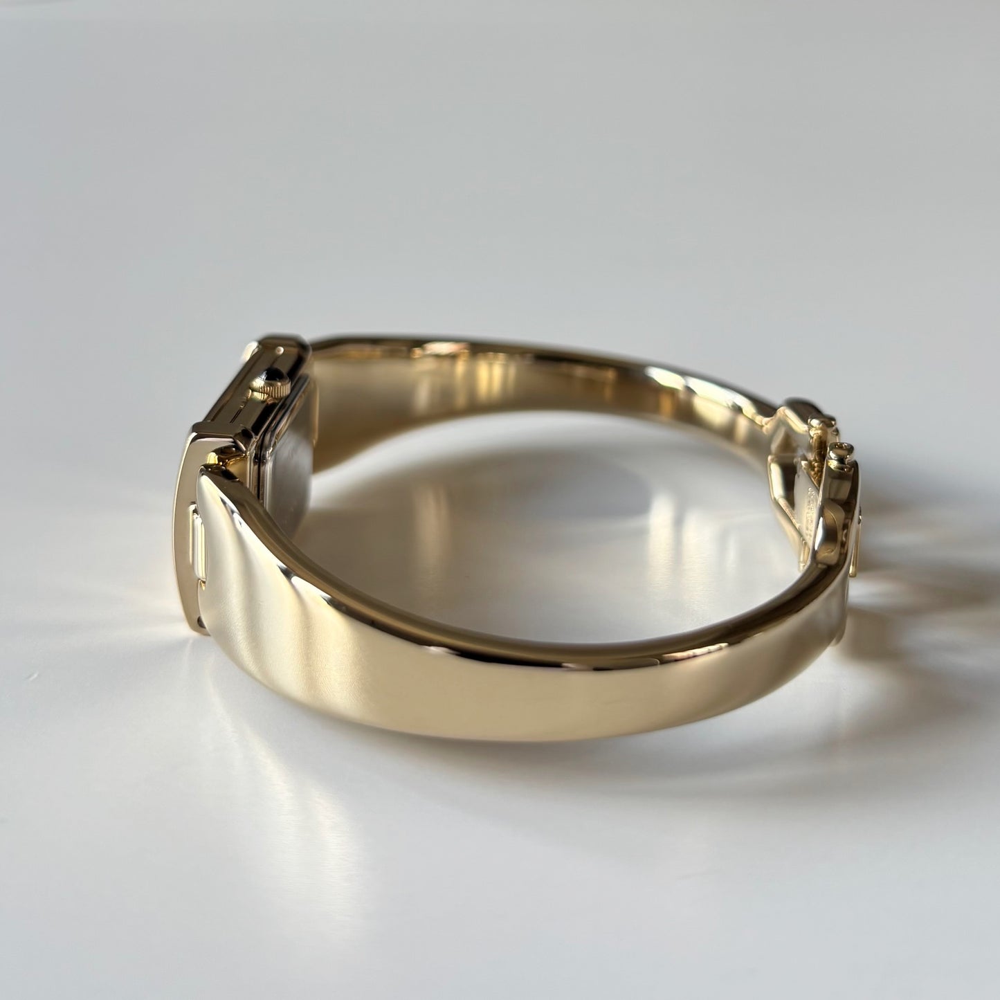 Yves Saint Laurent 1990s Peek-A-Boo Gold Plated Bangle Watch