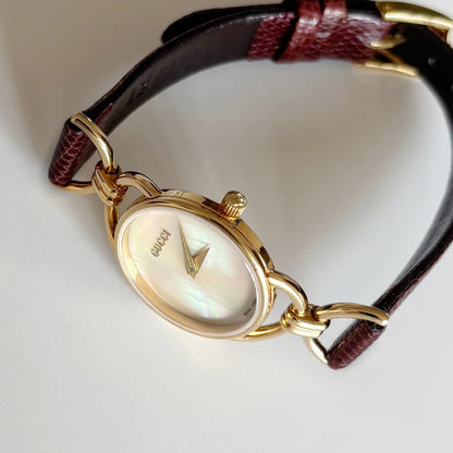 Gucci 1990s Seashell Dial Horsibit Gold Plated Watch