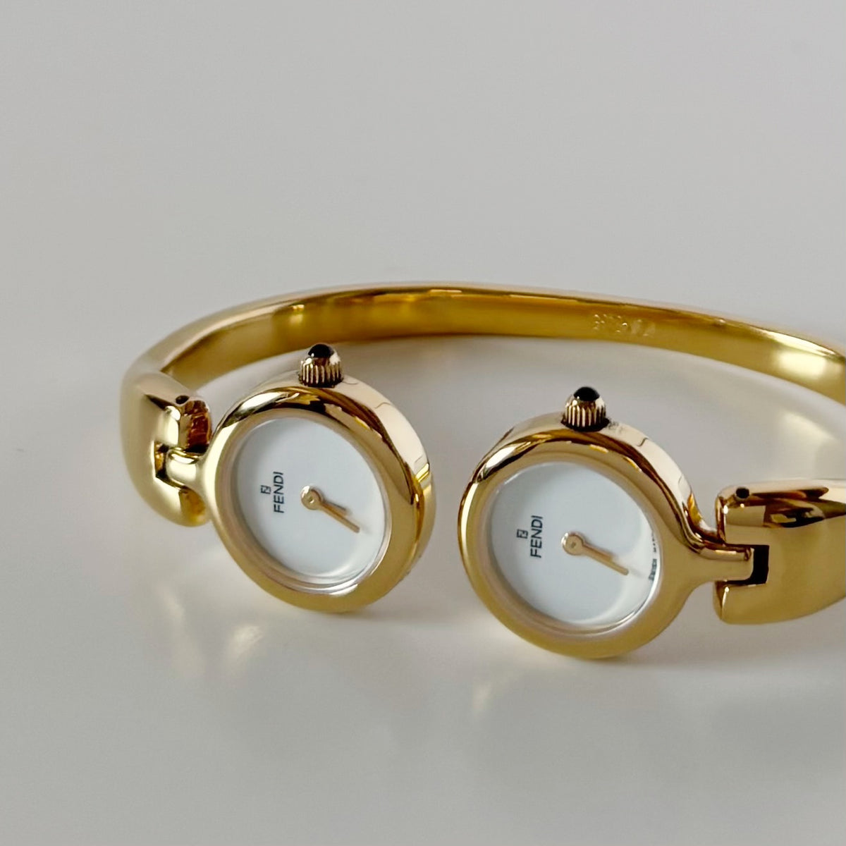 Fendi 1990s Seashell Dial Two Time Zone Gold Plated Bangle Watch