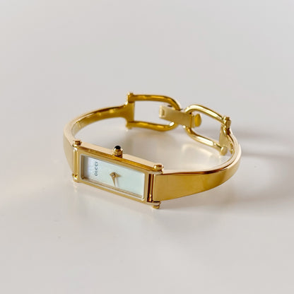Gucci 1990s Seashell Dial Rectangular Gold-Plated Bangle Watch