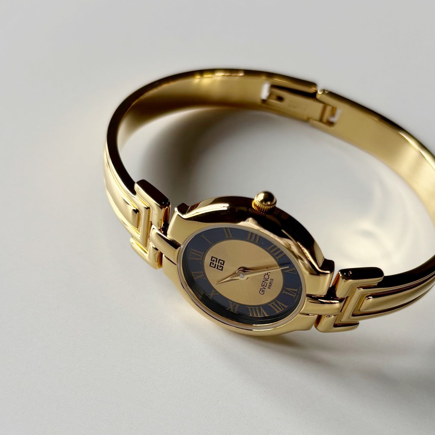 Givenchy 1990s Round Dial Gold Plated Bangle Watch