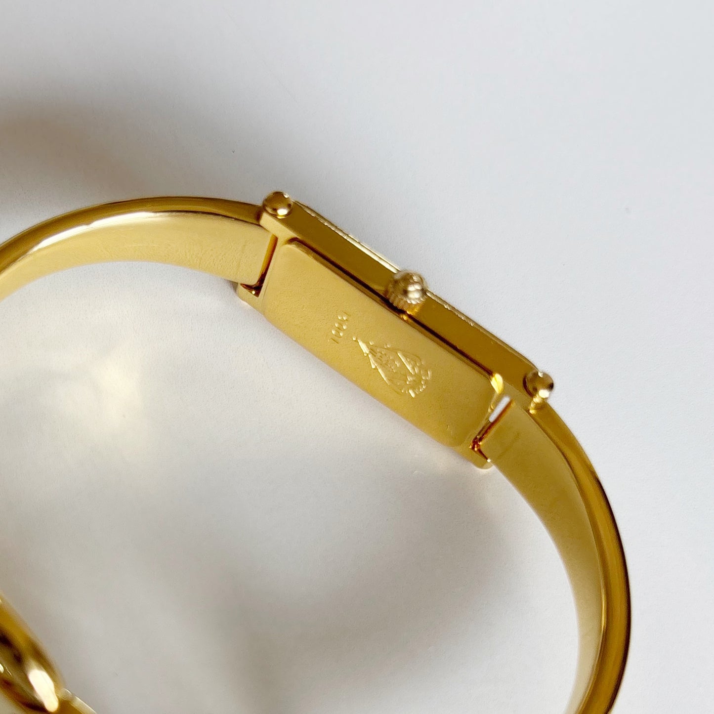 Gucci 1990s Rectangular Seashell Dial Gold Plated Bangle Watch