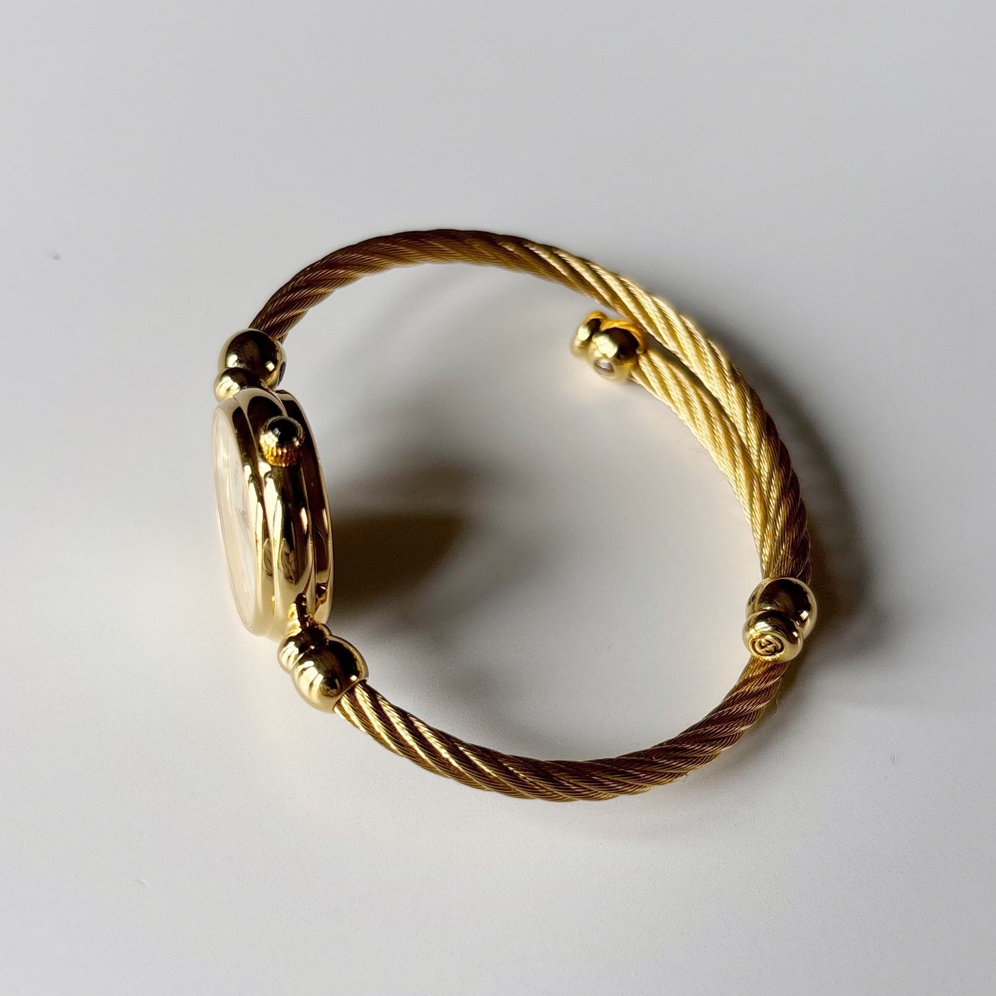 Gucci 1990s Seashell Dial Gold Plated Cable Bangle Watch
