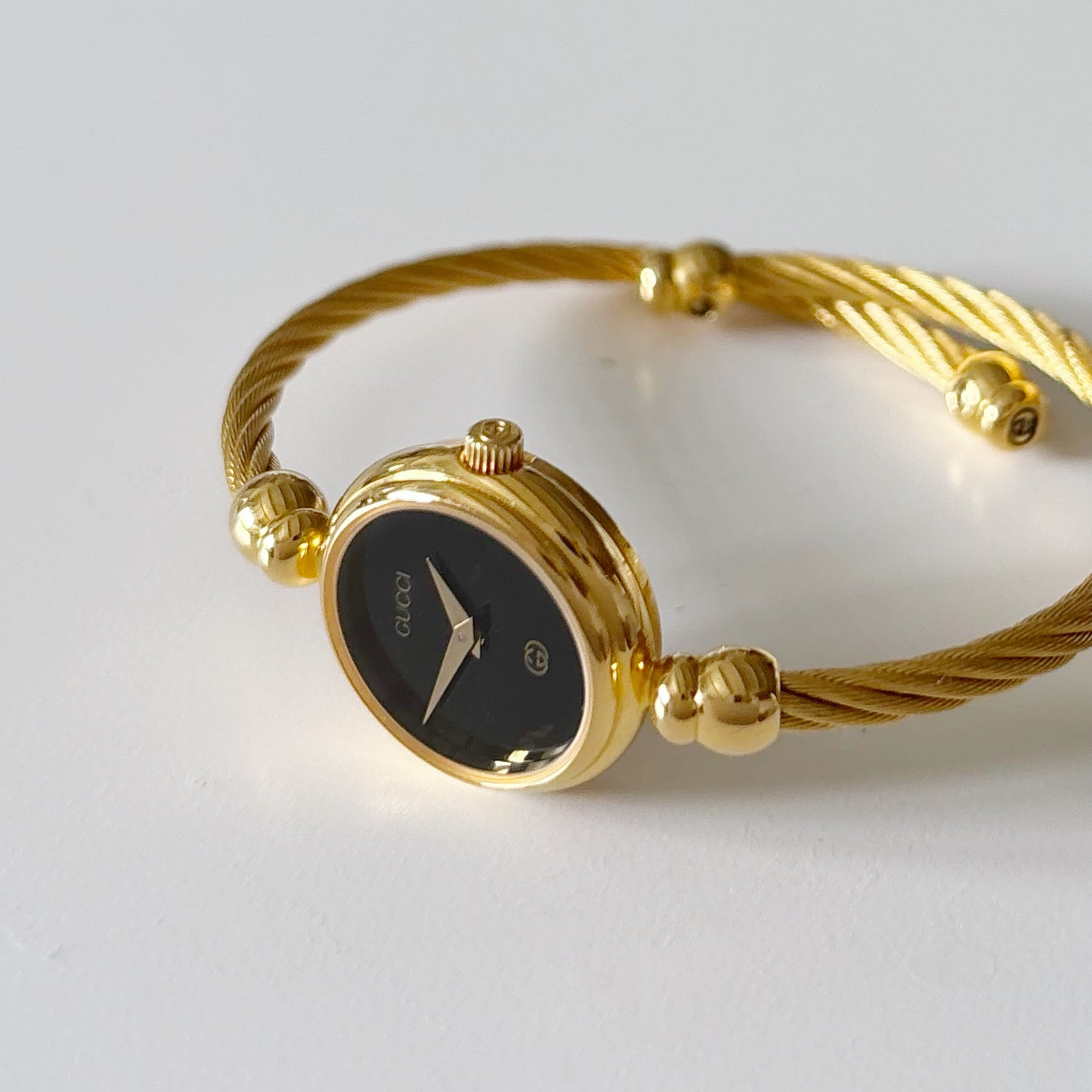 Gucci 1990s Black Dial Gold Plated Cable Bangle Watch