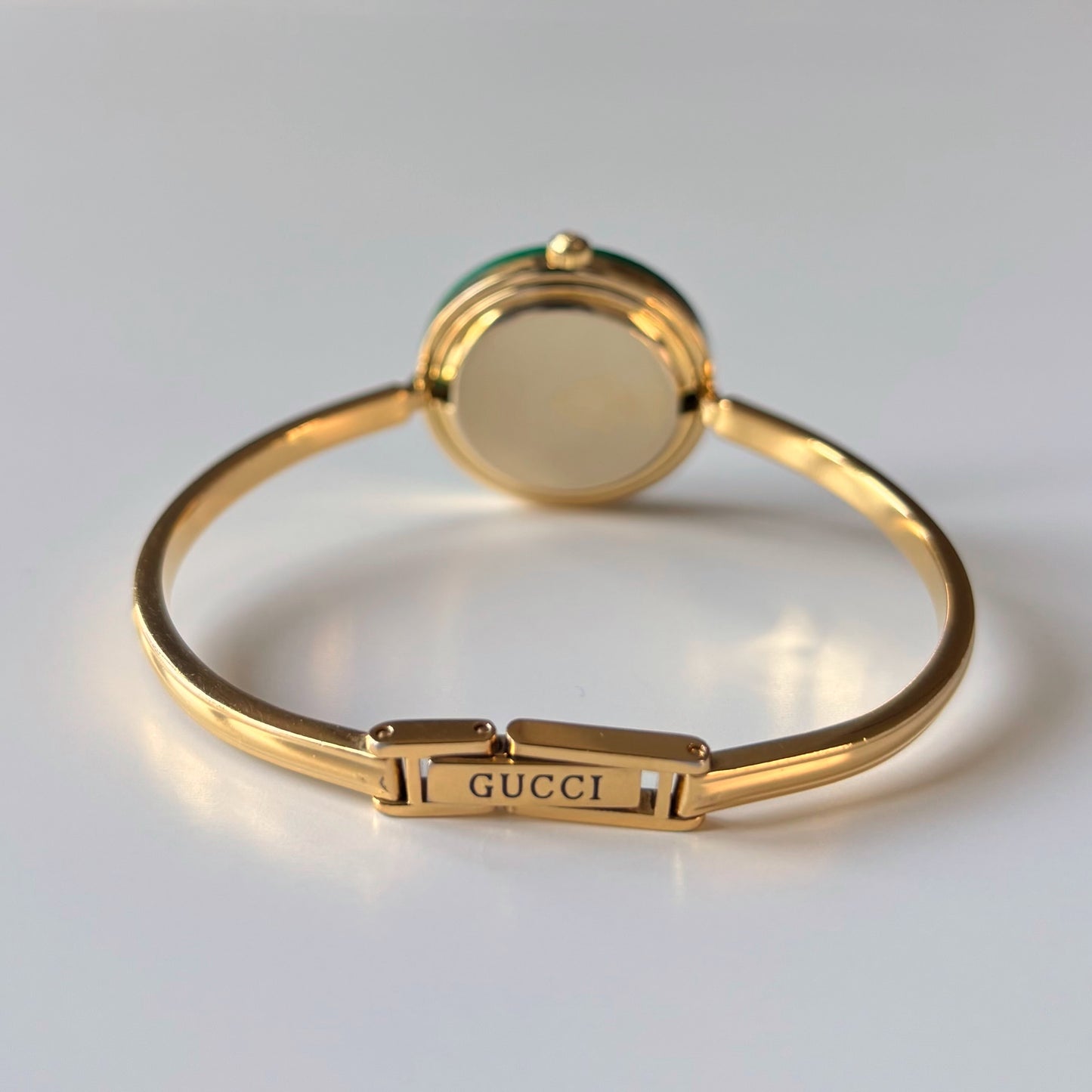 Gucci 1990s Interchangeable Bezel Gold Plated Bangle Watch with 12 bezels, case