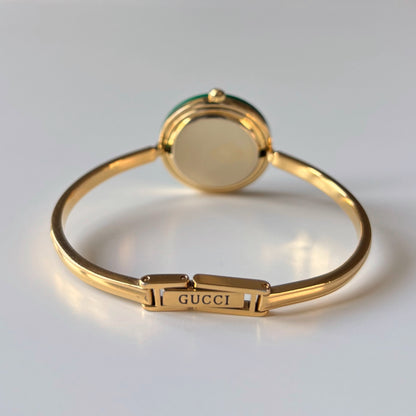 Gucci 1990s Interchangeable Bezel Gold Plated Bangle Watch with 12 bezels, case