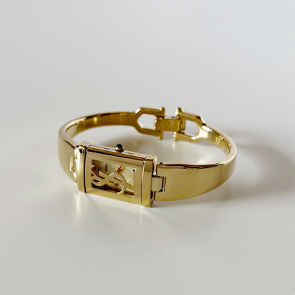 Yves Saint Laurent 1990s Peek-A-Boo Gold Plated Bangle Watch