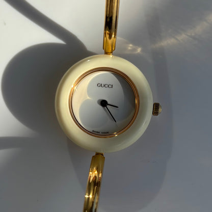 Gucci 1990s Interchangeable Bezel Gold Plated Bangle Watch with 12 bezels, case