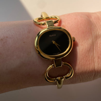 Gucci 1990s Black Dial Gold Plated Bangle Watch