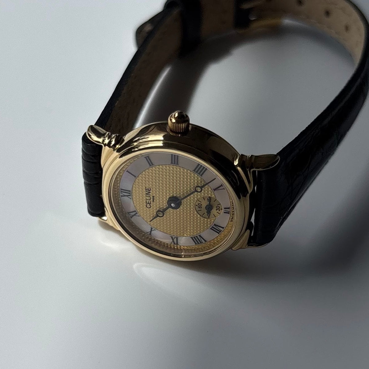 Celine 1980s Seashell Round Dial Gold Plated Watch