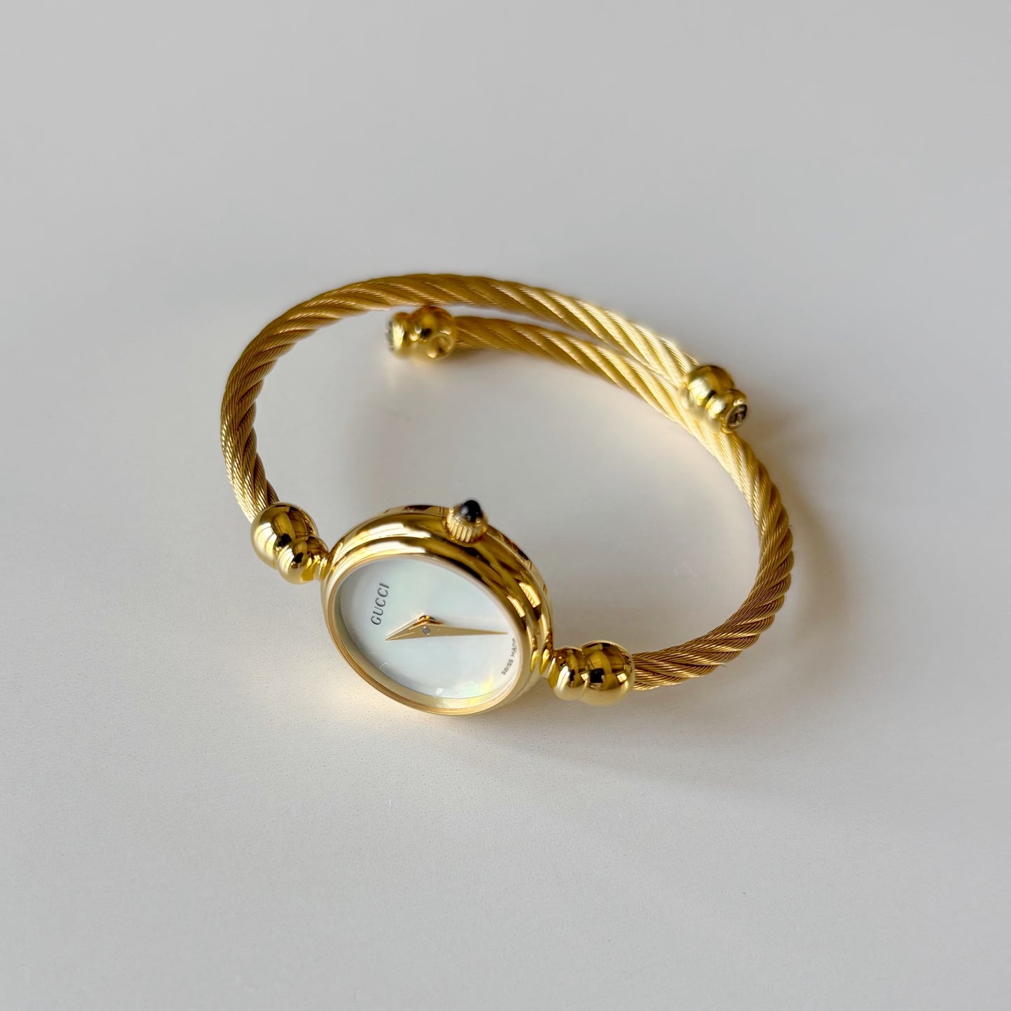 Gucci 1990s Seashell Dial Gold Plated Cable Bangle Watch