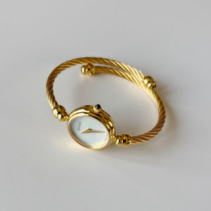Gucci 1990s Seashell Dial Gold Plated Cable Bangle Watch