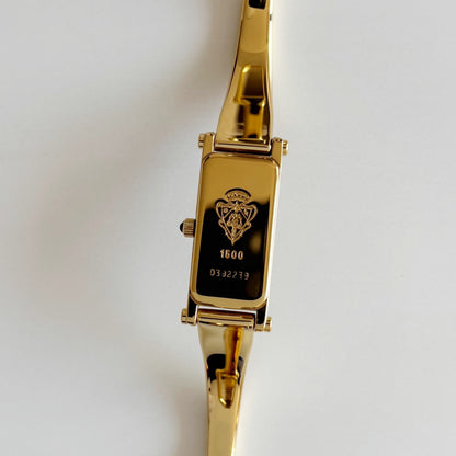 Gucci 1990s Seashell Dial Rectangular Gold Plated Bangle Watch