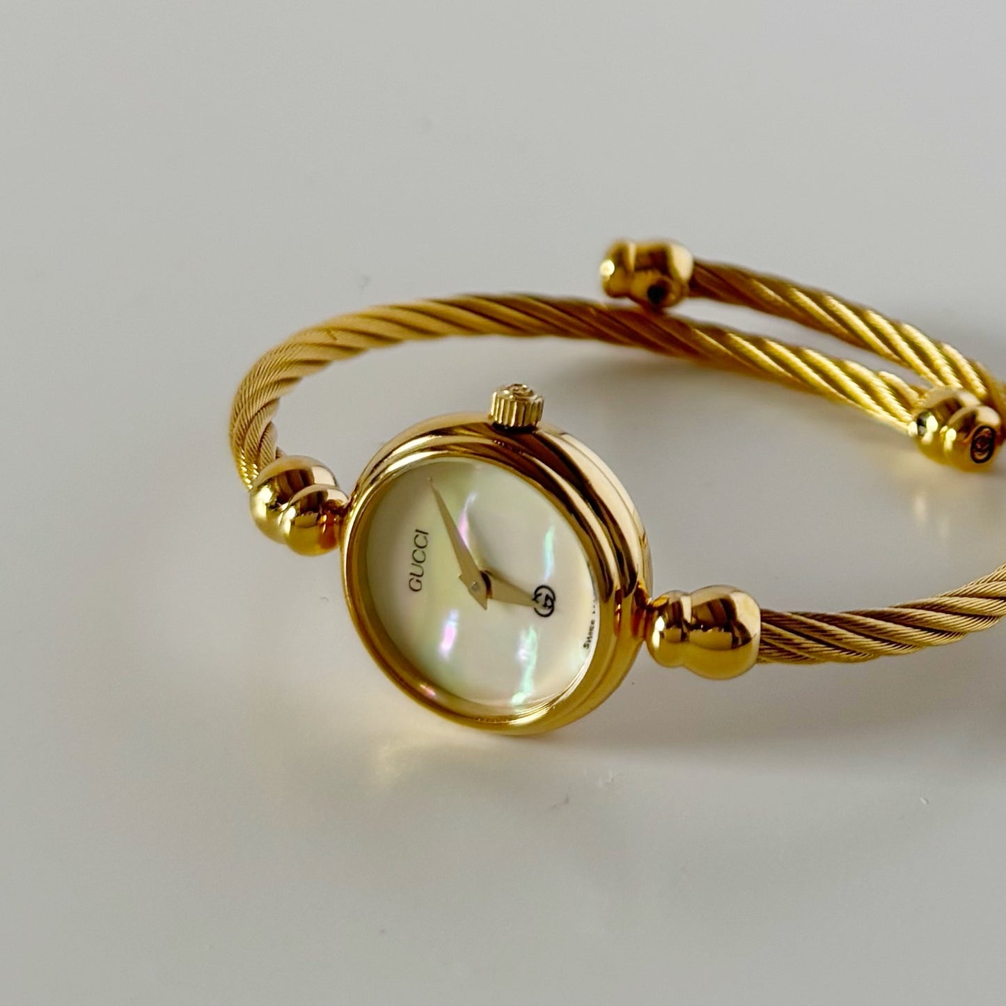 Gucci 1990s Seashell Dial Gold Plated Cable Bangle Watch
