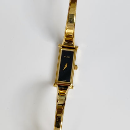 Gucci 1990s Black Dial Gold Plated Bangle Watch