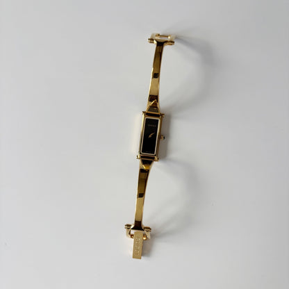 Gucci 1990s Black Rectangular Dial Gold Plated Bangle Watch
