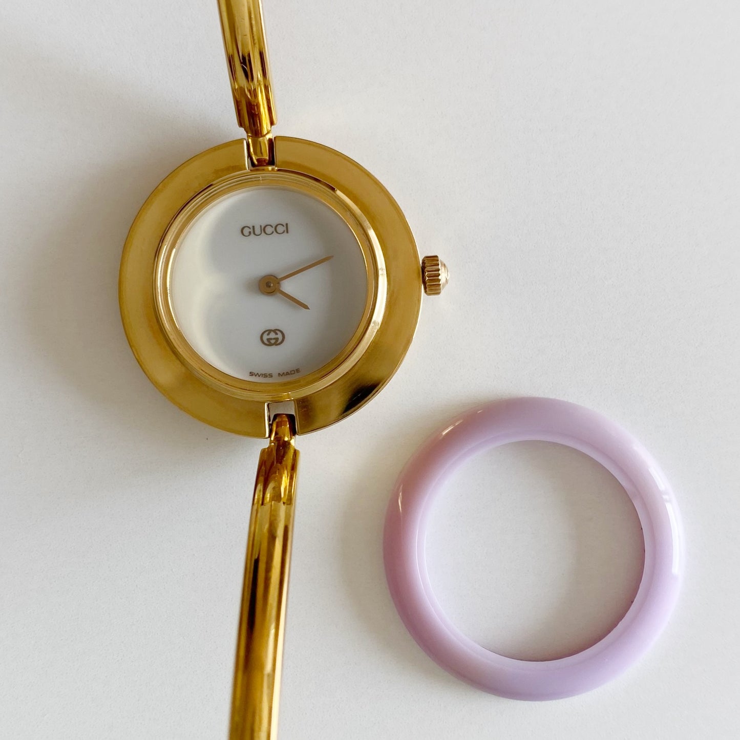 Gucci 1990s Interchangeable Bezel Gold Plated Bangle Watch with 12 bezels, case