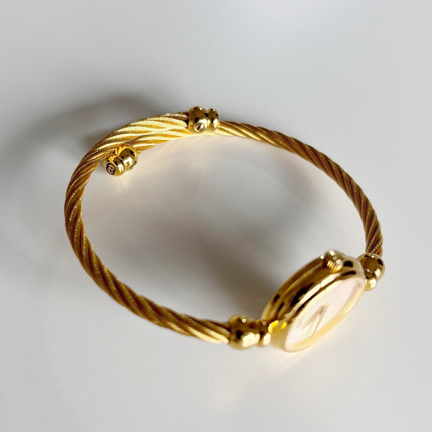 Gucci 1990s Seashell Dial Gold Plated Cable Band Bangle Watch