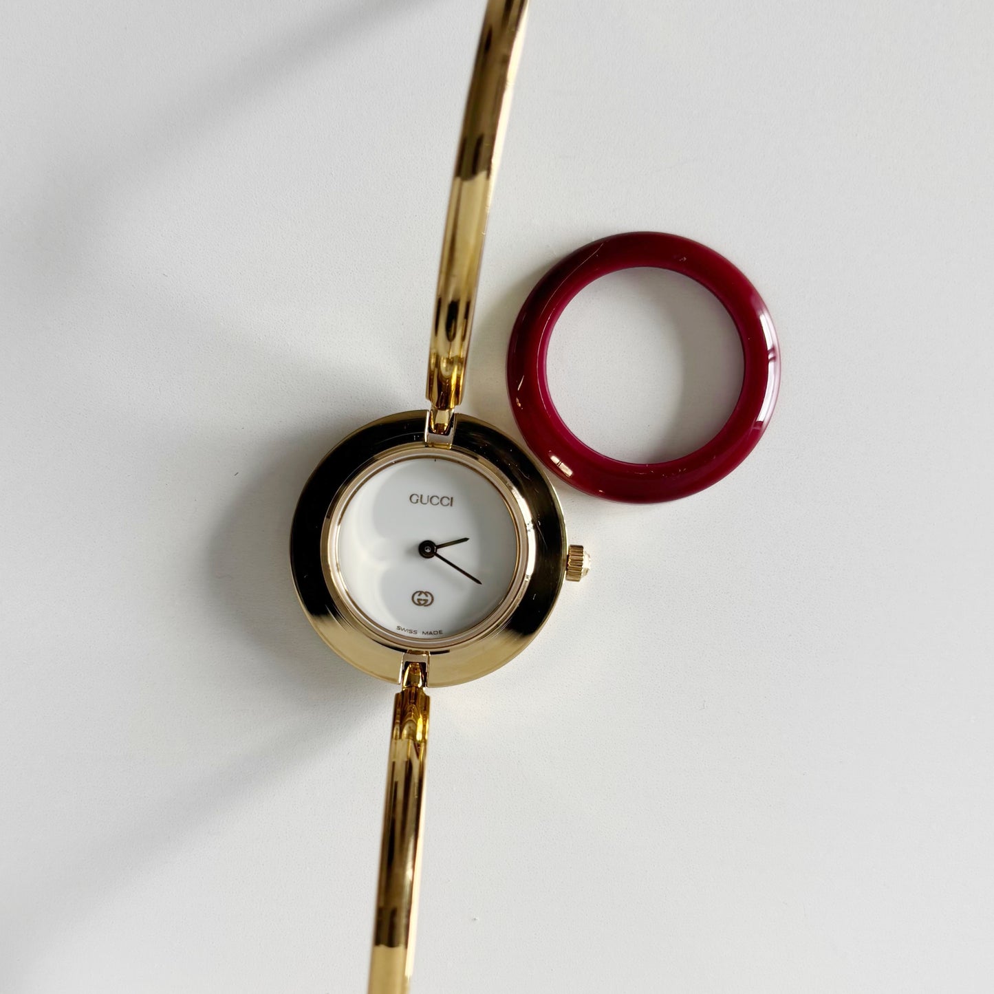 Gucci 1990s Interchangeable Bezel Gold Plated Bangle Watch with 12 bezels, case