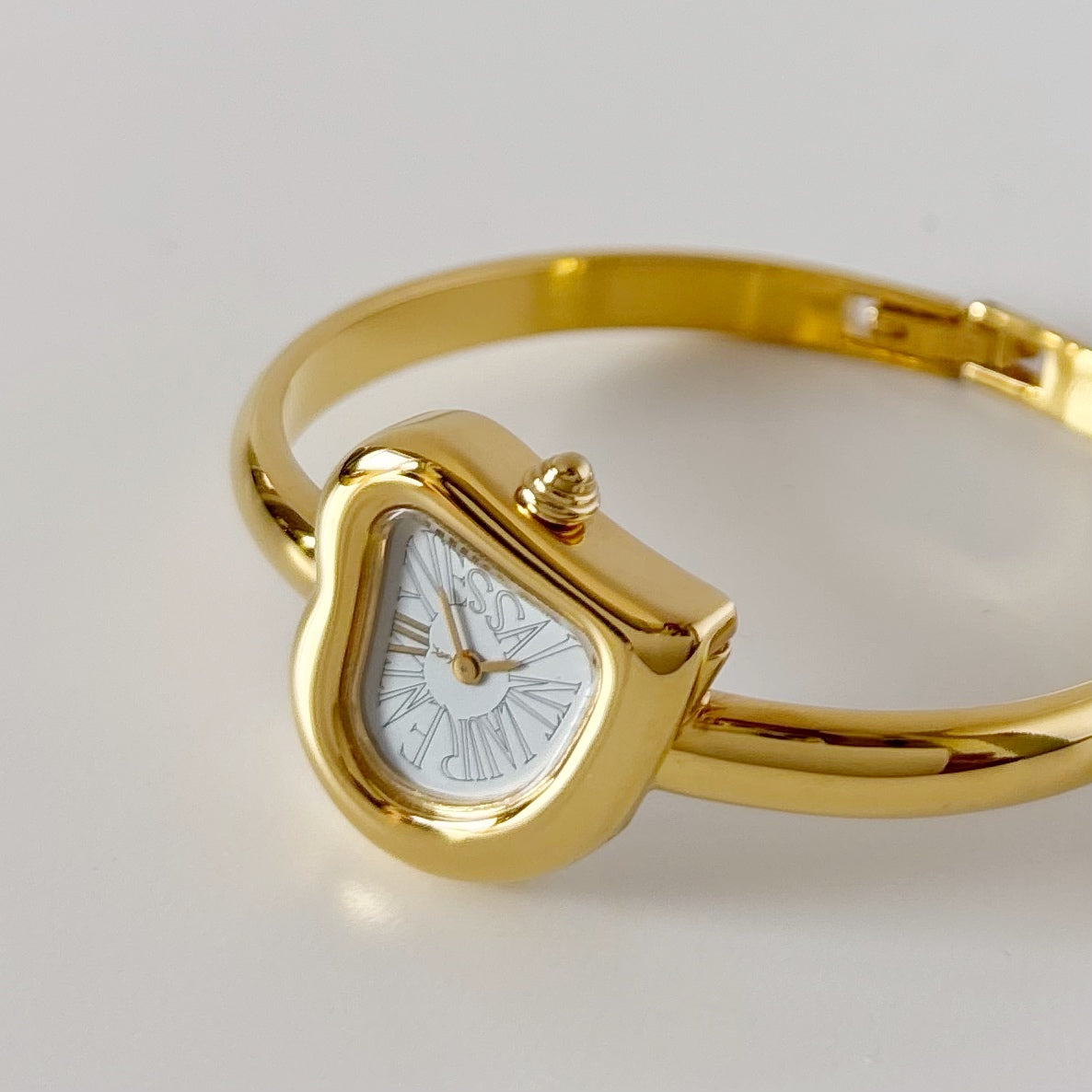 Yves Saint Laurent 1990s Heart Shaped Dial Gold Plated Bangle Watch