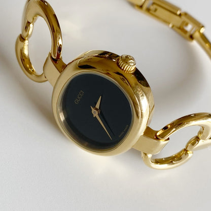 Gucci 1990s Black Dial Gold Plated Bangle Watch