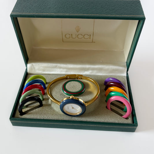 Gucci 1990s Interchangeable Bezel Gold Plated Bangle Watch with 12 bezels, case (Small)