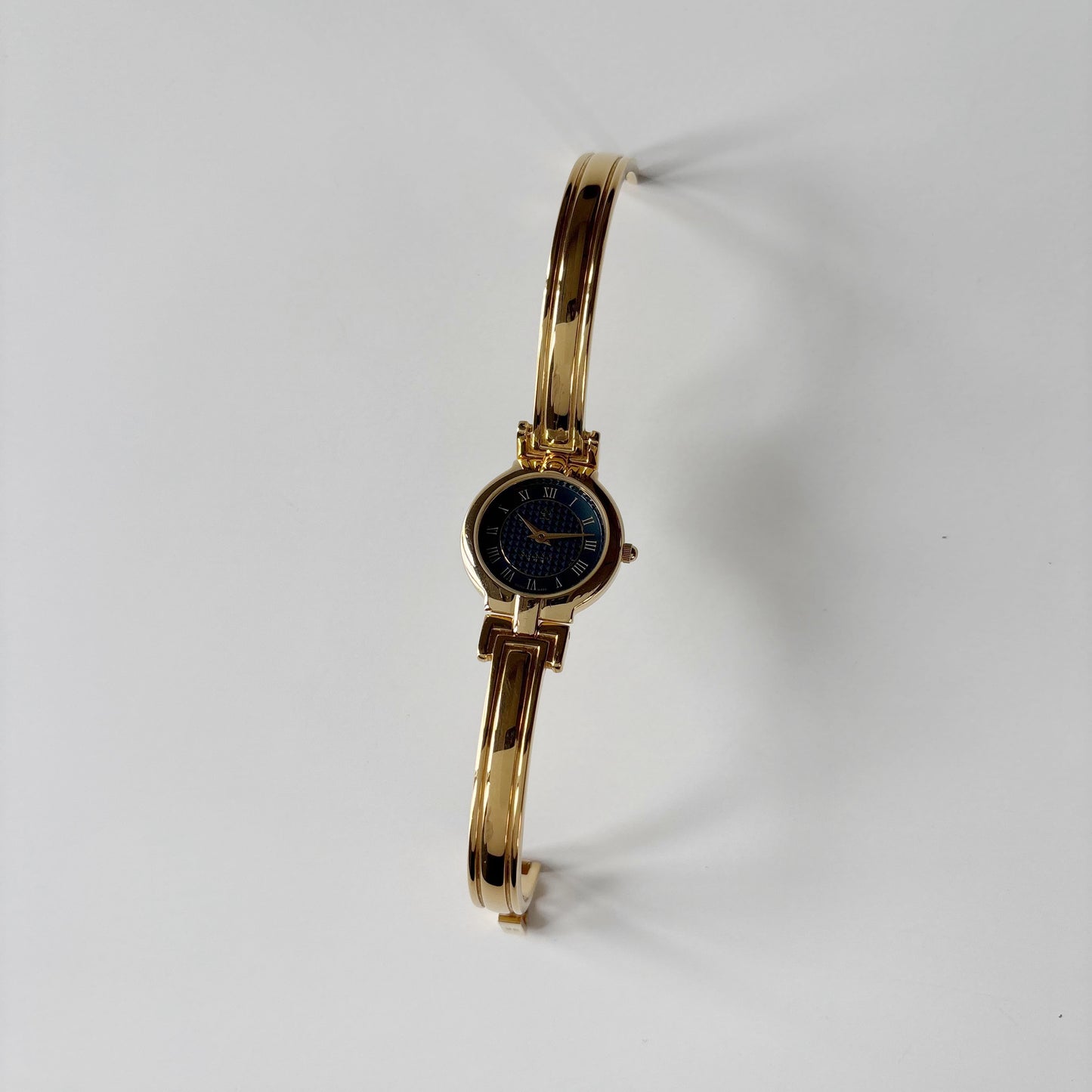 Givenchy 1990s Round Dial Gold Plated Bangle Watch