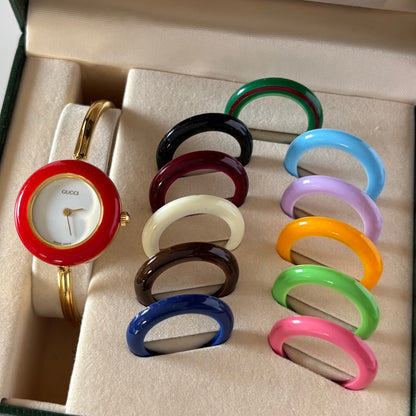 Gucci 1990s Interchangeable Bezel Gold Plated Bangle Watch with 12 bezels, case