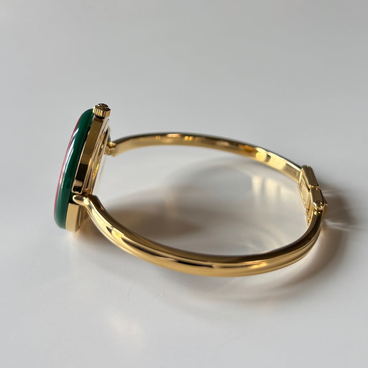 Gucci 1990s Interchangeable Bezel Gold Plated Bangle Watch with 12 bezels, case